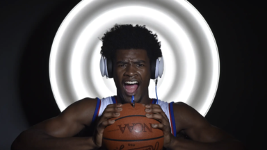 Watch KU's Josh Jackson squeeze the music out of the ball for portrait